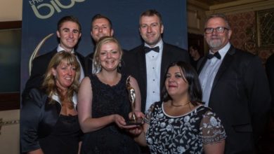 Group 55 celebrate after winning award