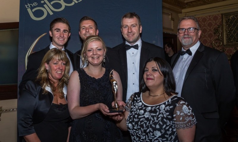 Group 55 celebrate after winning award